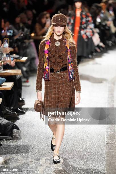 Model walks the runway during the CHANEL Metiers D'Art Fashion Show on December 07, 2023 in Manchester, England.