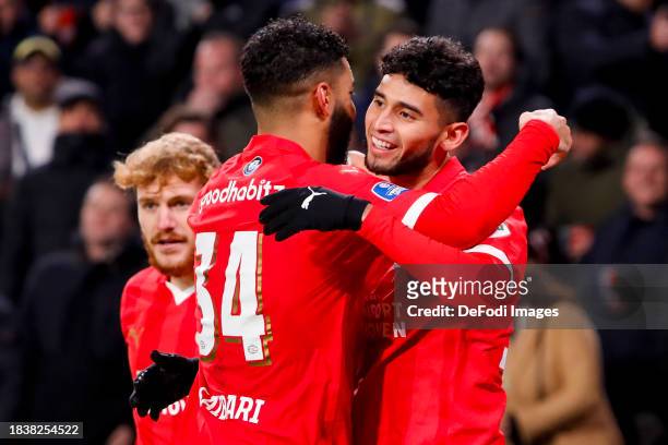 Ricardo Pepi of PSV Eindhoven scores the 2-0 celebrating his goal with teammates during the Dutch Eredivisie match between PSV Eindhoven and sc...