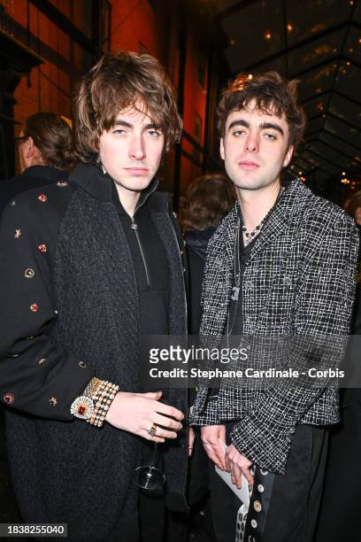 Gene Gallagher and Lennon Gallagher attend the CHANEL Metiers D'Art Show on December 07, 2023 in Manchester, England.