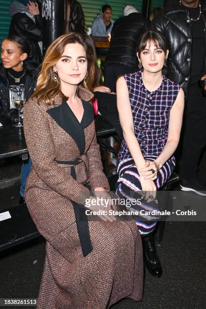 Jenna Coleman and Millie Brady attend the CHANEL Metiers D'Art Show on December 07, 2023 in Manchester, England.