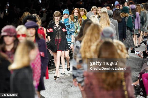 Models walk the runway during the CHANEL Metiers D'Art Fashion Show on December 07, 2023 in Manchester, England.