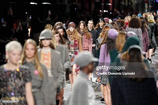 Models walk the runway during the CHANEL Metiers D'Art Fashion Show on December 07, 2023 in Manchester, England.