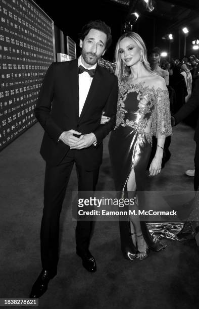 Adrien Brody and Georgina Chapman attend the red carpet on the closing night of the Red Sea International Film Festival 2023 on December 07, 2023 in...