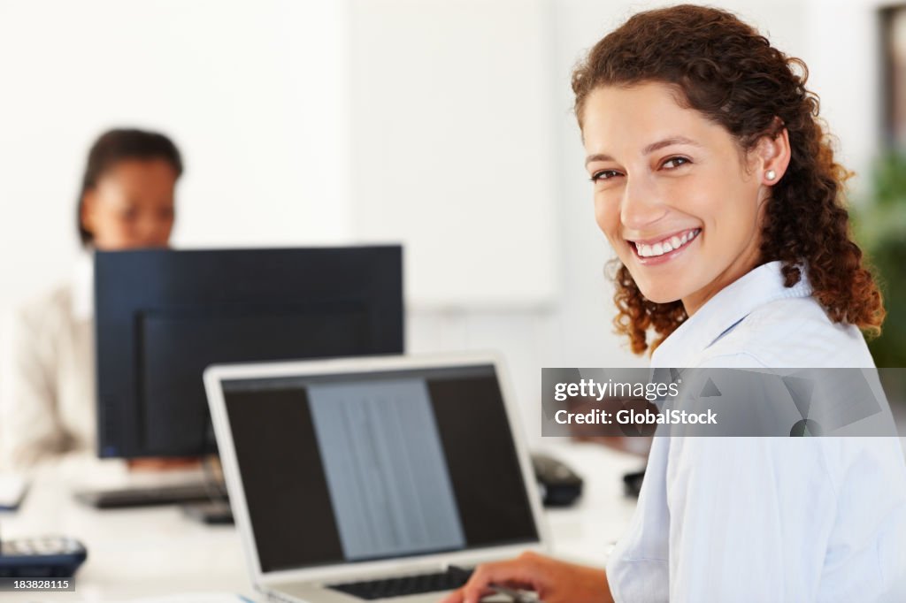 Business woman using a laptop