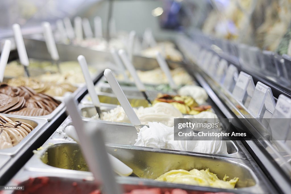 A restaurant refrigerator full of Italian ice creams