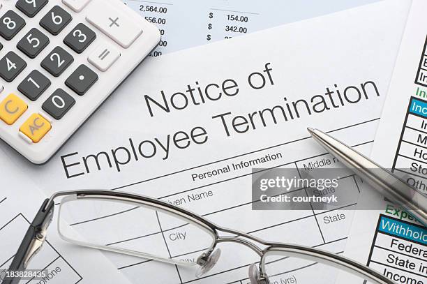 close up of employee termination form - finishing stock pictures, royalty-free photos & images