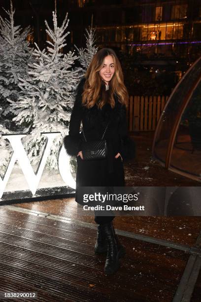 Rosa Crespo attends a special Christmas event hosted by IWC at Glide Battersea Power station on December 07, 2023 in London, England.