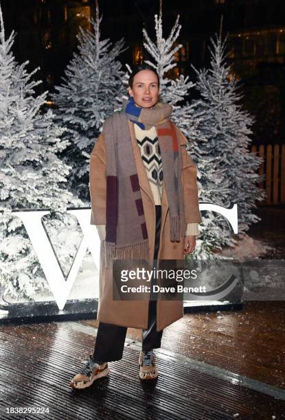 Alicia Rountree attends a special Christmas event hosted by IWC at Glide Battersea Power station on December 07, 2023 in London, England.