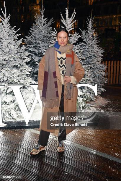 Alicia Rountree attends a special Christmas event hosted by IWC at Glide Battersea Power station on December 07, 2023 in London, England.