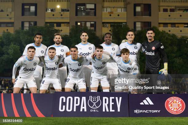 The Girona FC team line up for a photo prior to kick off the Copa del Rey second round match between Orihuela CF and Girona FC at Estadio Municipal...