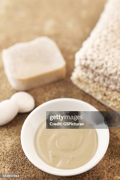 spa still life with mud mask and bar of soap - mud therapy stock pictures, royalty-free photos & images