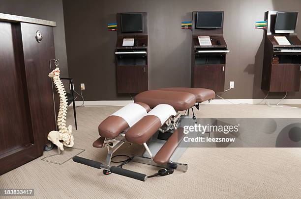 chiropractic table - chiropractic stock pictures, royalty-free photos & images