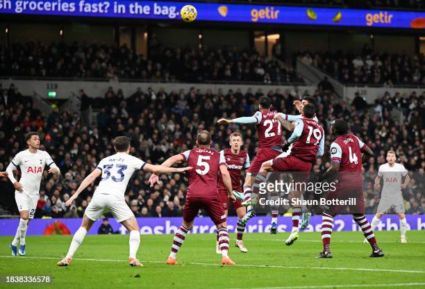 Cristian Romero of Tottenham Hotspur scores his team's first goal during the Premier League match between Tottenham Hotspur and West Ham United at...