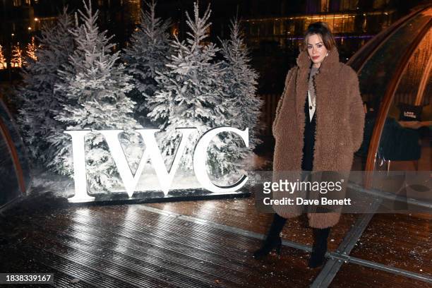 Roxanne McKee attends a special Christmas event hosted by IWC at Glide Battersea Power station on December 07, 2023 in London, England.
