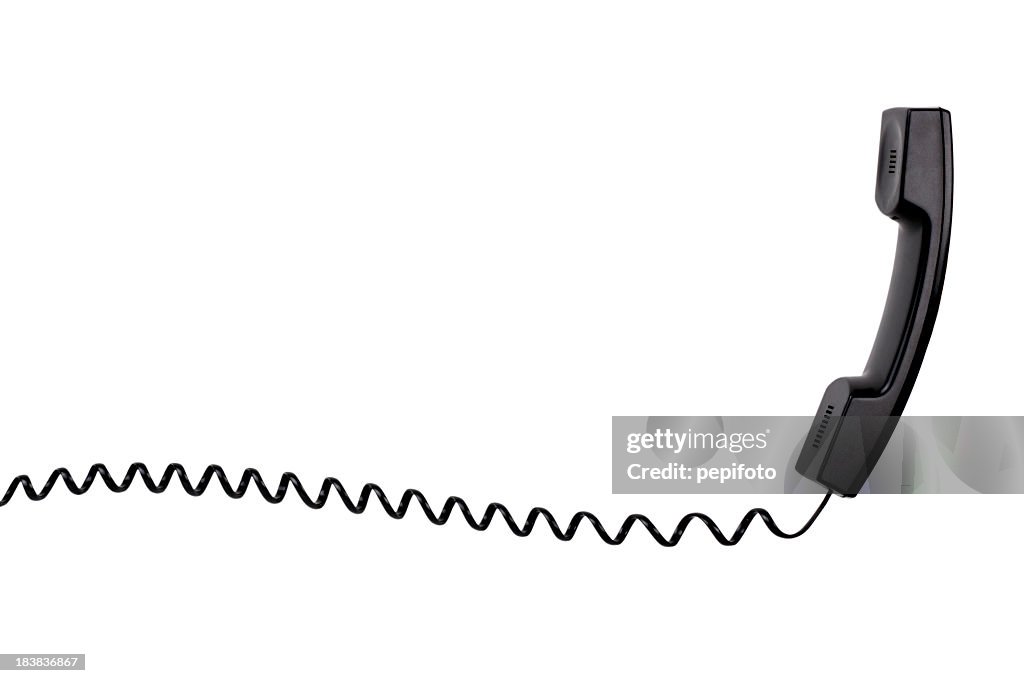 A black telephone with a spiral cord