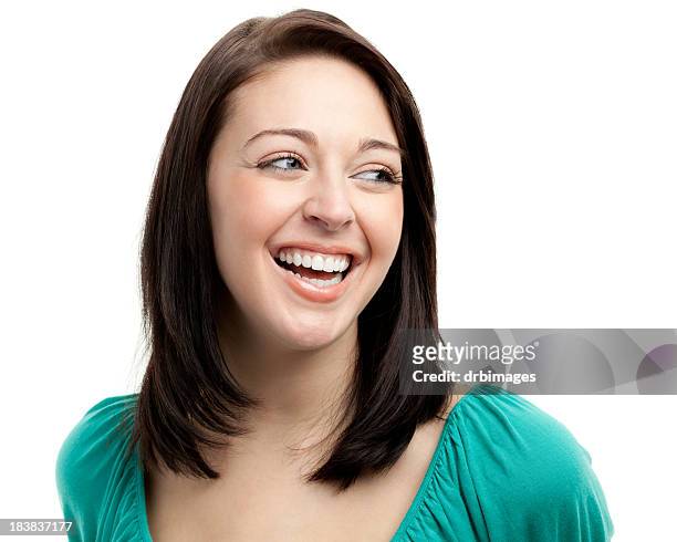 happy laughing young woman looking sideways - sideways glance stock pictures, royalty-free photos & images