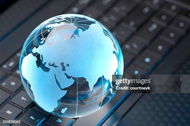 glass globe and computer keyboard - glass map india stock pictures, royalty-free photos & images