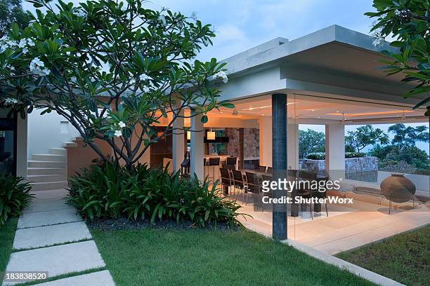 villa in the tropics - new patio stock pictures, royalty-free photos & images