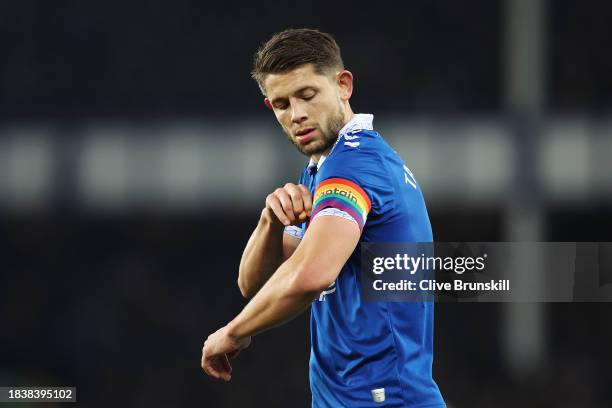 James Tarkowski of Everton adjusts the rainbow armband during the Premier League match between Everton FC and Newcastle United at Goodison Park on...