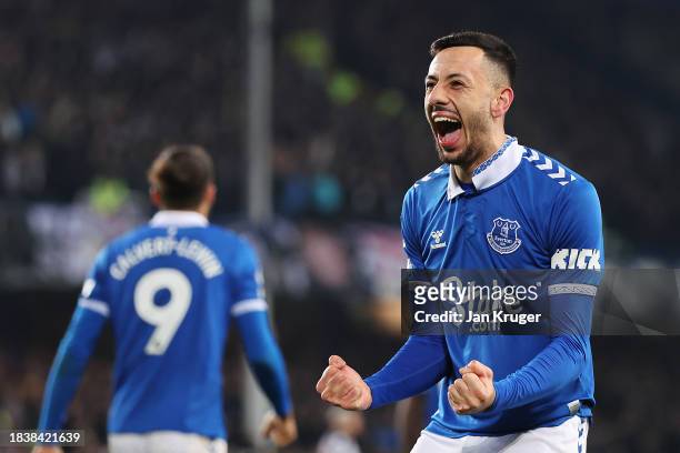 Dwight McNeil of Everton celebrates scoring his team's first goal during the Premier League match between Everton FC and Newcastle United at Goodison...
