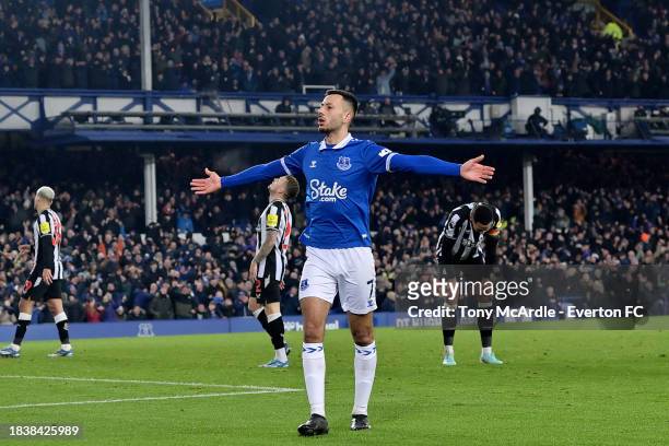 Dwight McNeil of Everton celebrates his goal during the Premier League match between Everton FC and Newcastle United at Goodison Park on December 07,...