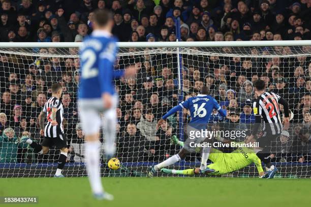 Abdoulaye Doucoure of Everton scores his team's second goal during the Premier League match between Everton FC and Newcastle United at Goodison Park...