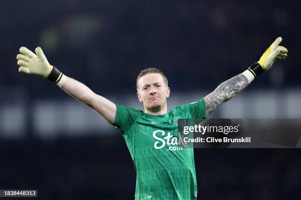 Jordan Pickford of Everton celebrates after teammate Beto scores his team's third goal during the Premier League match between Everton FC and...