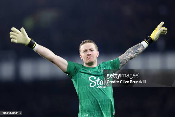 Jordan Pickford of Everton celebrates after teammate Beto scores his team's third goal during the Premier League match between Everton FC and...