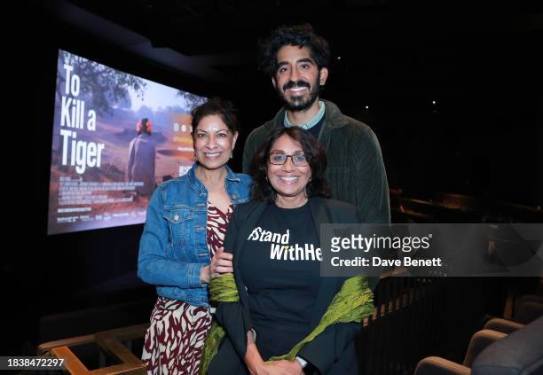 Dev Patel, Geeta Sondhi and Nisha Pahuja attend a special screening of Notice Picture's "To Kill a Tiger" on December 07, 2023 in London, England.