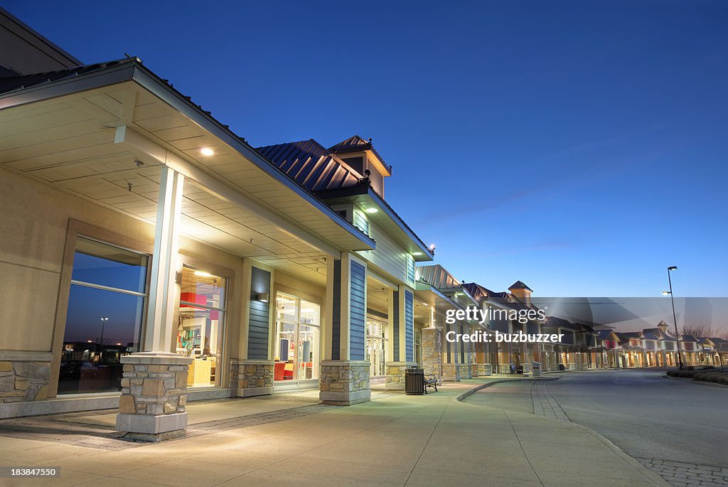 Modern Store Building Exteriors at Sunset