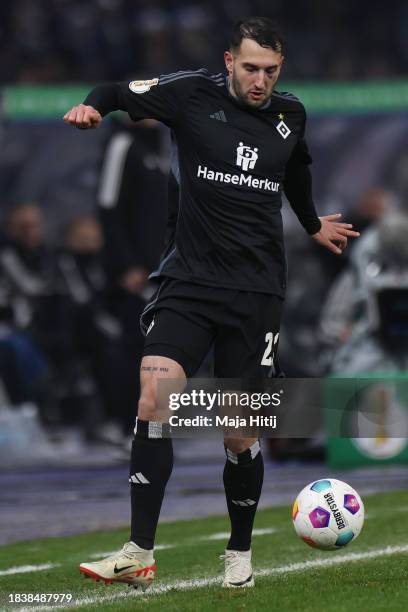 Levin Öztunali of Hamburger SV controls the ball during the DFB cup round of 16 match between Hertha BSC and Hamburger SV at Olympiastadion on...