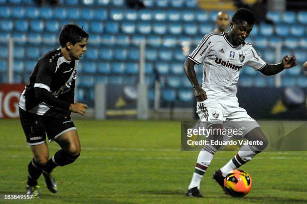 Rhayner of Fluminense fights for the ball with Fagner of Vasco during the match between Vasco and Fluminense for the Brazilian Series A 2013 at...