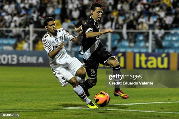 Michael of Fluminense fights for the ball with Felipe Soutto of Vasco during the match between Vasco and Fluminense for the Brazilian Series A 2013...