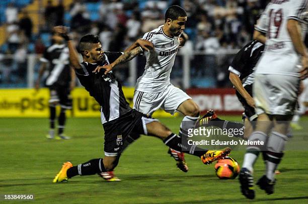 Bruno of Fluminense fights for the ball with Henrique of Vasco during the match between Vasco and Fluminense for the Brazilian Series A 2013 at...