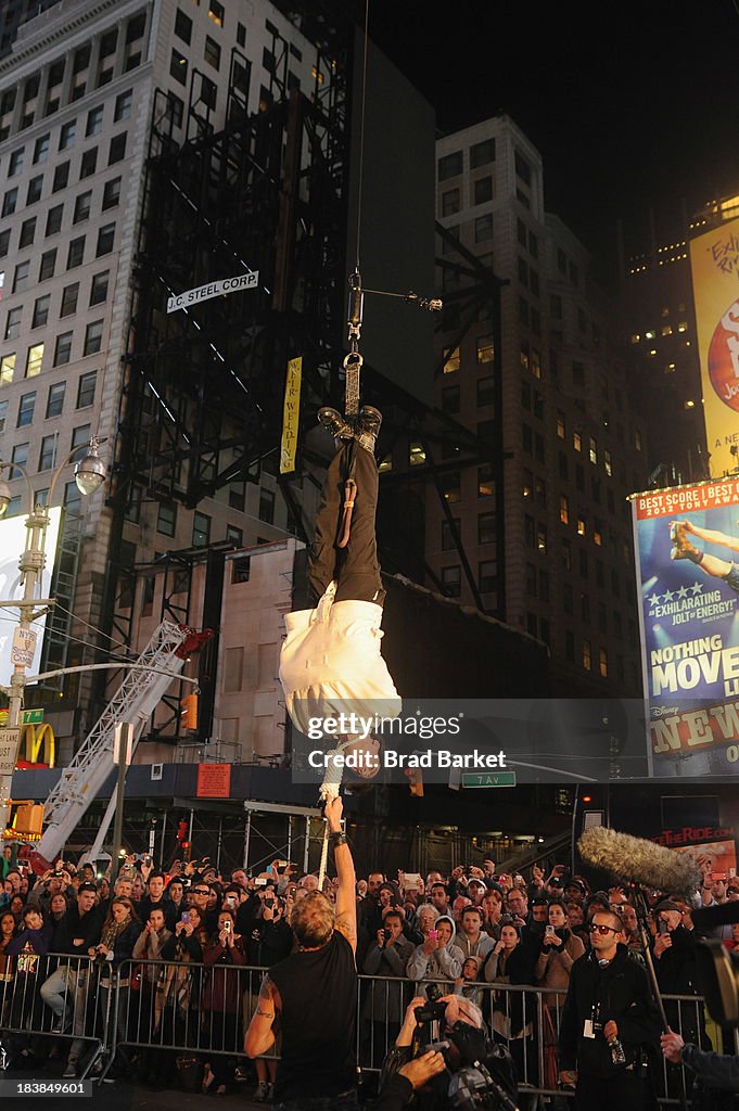 Criss Angel Performs Double Straight Jacket Escape In The Middle Of Times Square For His New Spike TV Series "Criss Angel BeLIEve"