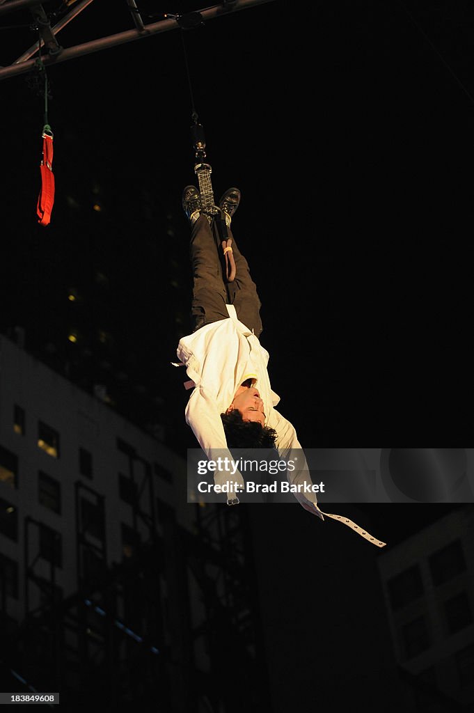 Criss Angel Performs Double Straight Jacket Escape In The Middle Of Times Square For His New Spike TV Series "Criss Angel BeLIEve"