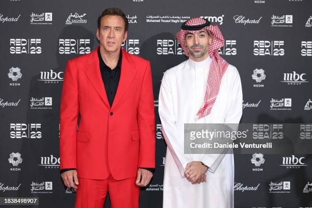 Nicolas Cage and CEO of the Red Sea International Film Festival Mohammed Al Turki attend the red carpet on the closing night of the Red Sea...