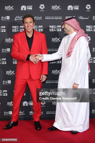 Nicolas Cage and CEO of the Red Sea International Film Festival Mohammed Al Turki attend the red carpet on the closing night of the Red Sea...