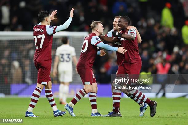 Jarrod Bowen of West Ham United celebrates with teammates Nayef Aguerd , Tomas Soucek and Kurt Zouma following the Premier League match between...