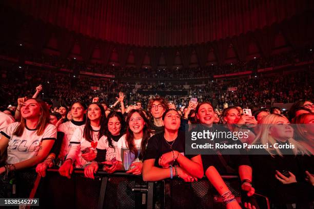 The audience watch as Calcutta performs at Palazzo dello Sport on December 7, 2023 in Rome, Italy.