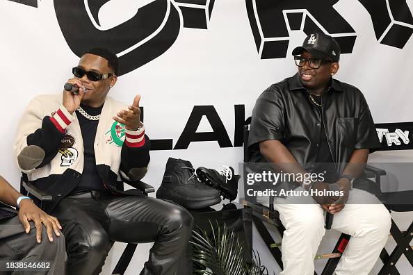 SYMBA and Omar Bailey speak to guests during the FCTRY LAb x Art