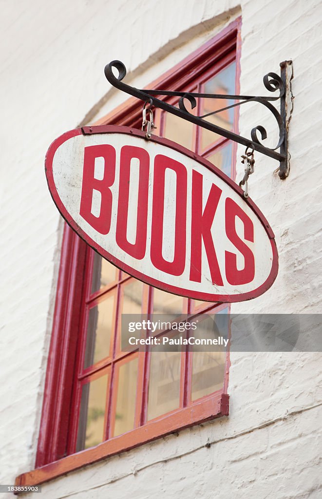 Antique style bookstore with red text