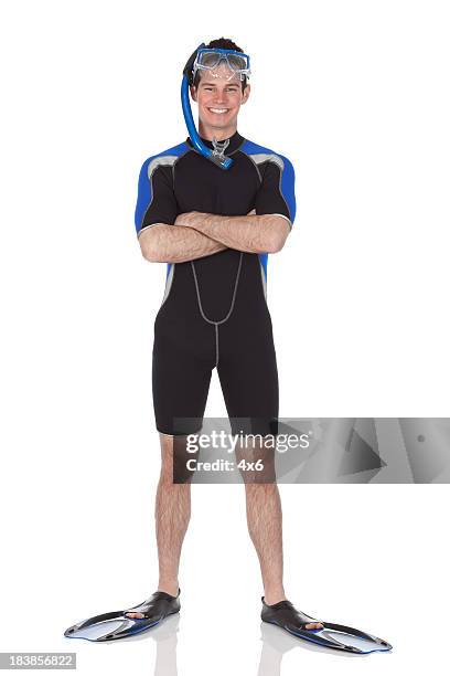 man in scuba gear standing with arms crossed - flippers bildbanksfoton och bilder