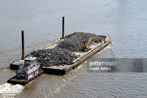 tug and barge with stone - tug barge stock pictures, royalty-free photos & images