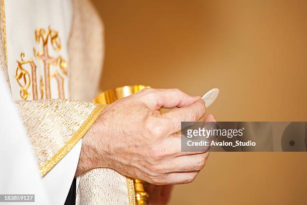 communion and clergyman - pope stock pictures, royalty-free photos & images