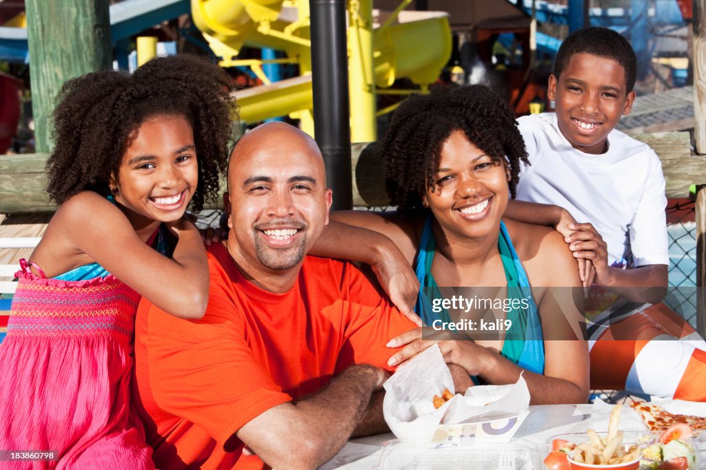 Family having lunch at water park