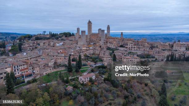 Beautiful view of San Gimignano is being seen in Tuscany, Italy, on December 9, 2023. The small medieval town, located in the province of Siena,...