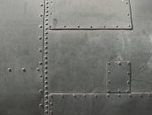 Close-up of military detail in a dark gray color