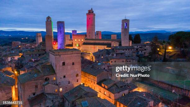 The towers in San Gimignano, Tuscany, Italy, are being illuminated for the Christmas festivities on December 9, 2023. The small medieval town is...