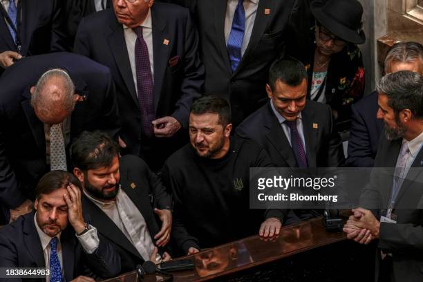 Volodymyr Zelenskiy, Ukraine's president, center, speaks with Gabriel Boric, Chile's president, second left, attend the inauguration ceremony of...